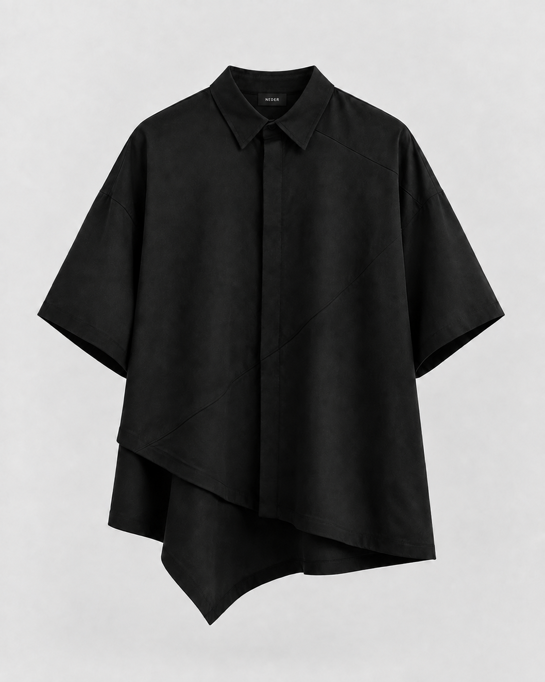 Oversized black shirt with a diagonal overlapping front, concealed buttons and an elongated side hem