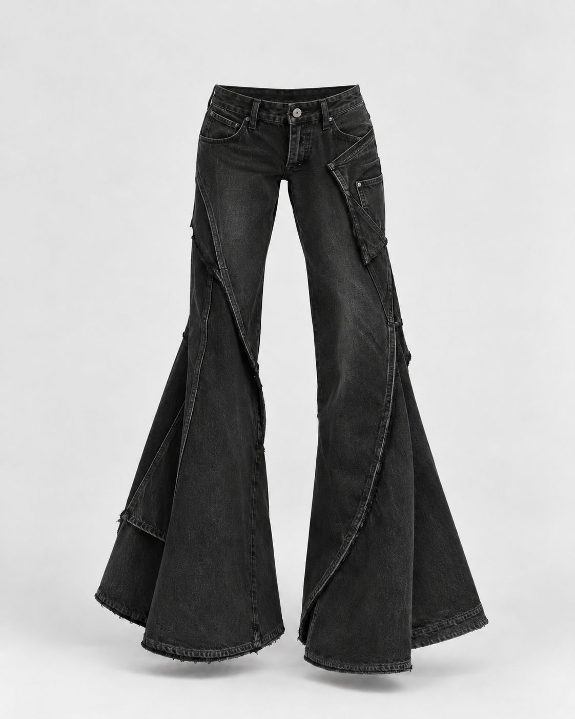 Washed charcoal jeans with curved deconstructed panels and exaggerated flares